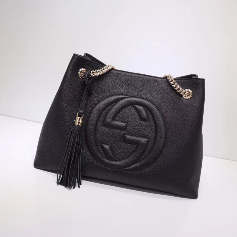 G*u*i shopping bags